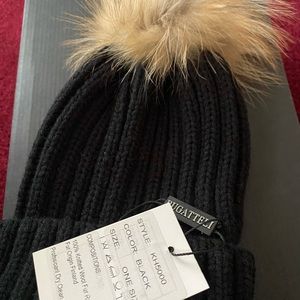 High quality thick knit hat with removable raccoon pom-pom